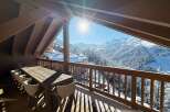 Experience the ultimate in luxury living with this stunning property, boasting breathtaking views of snow-capped mountains.