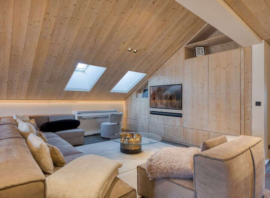 This stunning living space showcases a modern design with a touch of rustic charm.