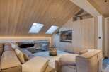 This stunning living space showcases a modern design with a touch of rustic charm.
