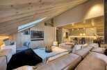This stunning property boasts a modern interior with a cozy, inviting atmosphere.