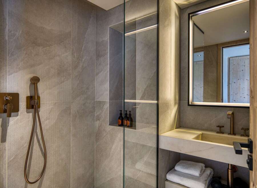 Step into luxury with this stunning bathroom design.