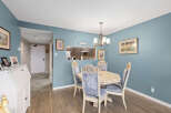 This charming dining area features a stylish table and chairs, perfect for intimate gatherings.