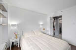 This bright and airy bedroom offers a serene retreat.