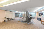 This well-equipped gym offers a variety of workout options for residents.