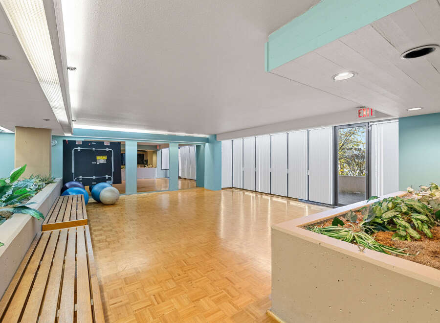 This spacious interior boasts a bright and airy atmosphere, perfect for various activities.