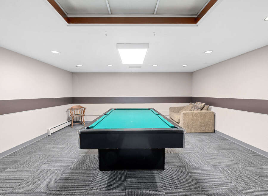This property boasts a dedicated game room, perfect for entertainment and relaxation.