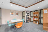 Discover a cozy reading nook in this inviting space! This room features a table and chairs, perfect for enjoying a good book.