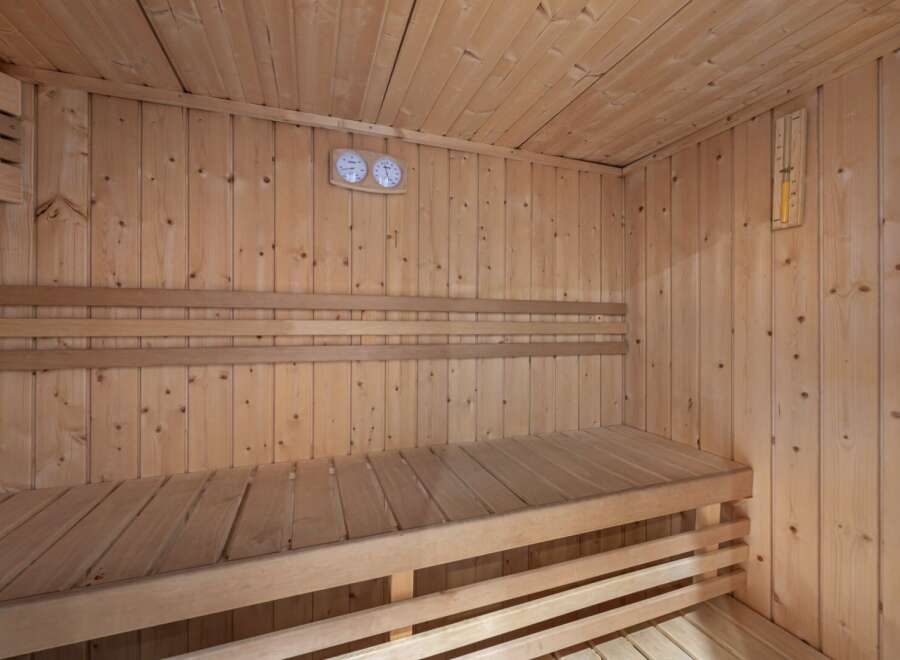 Step into relaxation in this inviting sauna.
