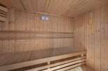 Step into relaxation in this inviting sauna.