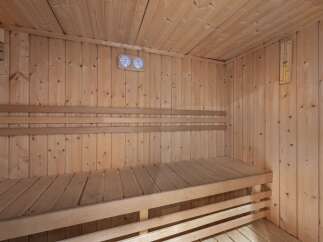 Step into relaxation in this inviting sauna.