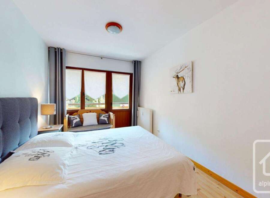 Discover the charm of this cozy bedroom, perfect for a relaxing retreat.
