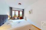 Discover the charm of this cozy bedroom, perfect for a relaxing retreat.