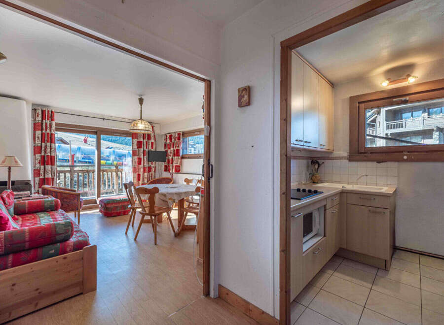 Discover this charming property featuring a cozy living area with a balcony, perfect for enjoying scenic views.