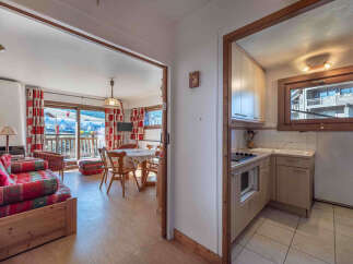 Discover this charming property featuring a cozy living area with a balcony, perfect for enjoying scenic views.