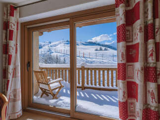 Enjoy breathtaking mountain views from this cozy ski chalet.