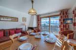 This charming property boasts a cozy dining area, perfect for gatherings.