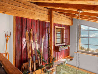 Experience rustic charm and breathtaking views in this unique property.