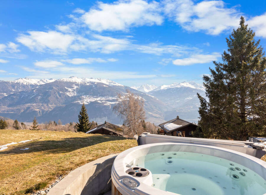 Enjoy breathtaking mountain views from this luxurious property.