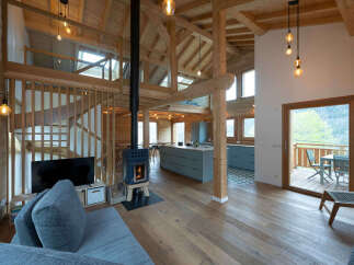 Experience the warmth of this stunning wooden cabin, perfect for a cozy retreat.