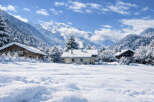 Escape to a winter wonderland in this charming mountain property.