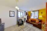 Discover the charm of this inviting living space, perfect for relaxation and entertaining.