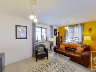 Discover the charm of this inviting living space, perfect for relaxation and entertaining.