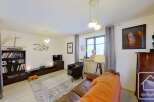 Discover this charming living space, perfect for relaxation and entertaining.