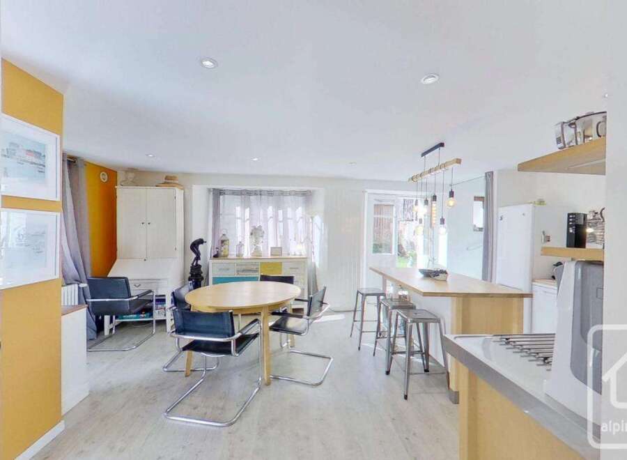This stunning property boasts a bright and airy open-plan living space, perfect for modern living.