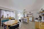 Discover this charming property featuring a modern kitchen with a stylish island and seating.