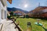 Discover this charming property with a lush green lawn, perfect for outdoor relaxation.