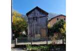 Discover the charm of this unique property! This rustic wooden structure offers a glimpse into a simpler time, with its weathered facade and classic design.