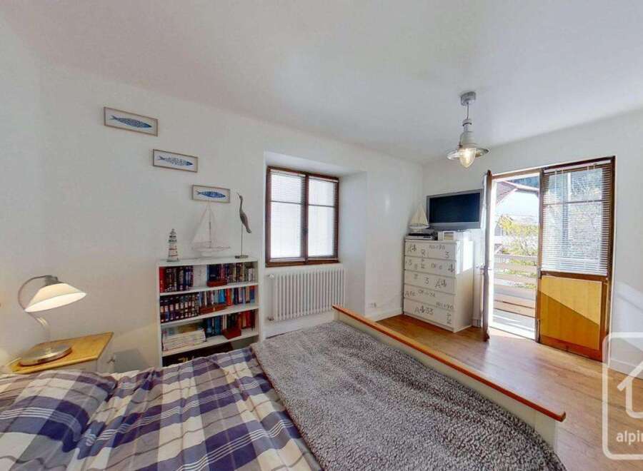 Discover the charm of this cozy bedroom, perfect for a relaxing retreat.