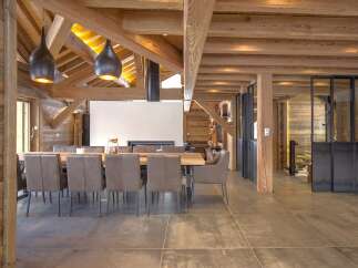 This stunning property boasts a rustic yet modern design, perfect for a luxurious living experience.