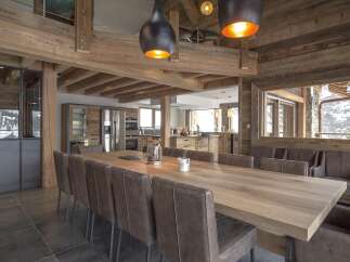 This stunning property boasts a spacious dining area, perfect for hosting gatherings.
