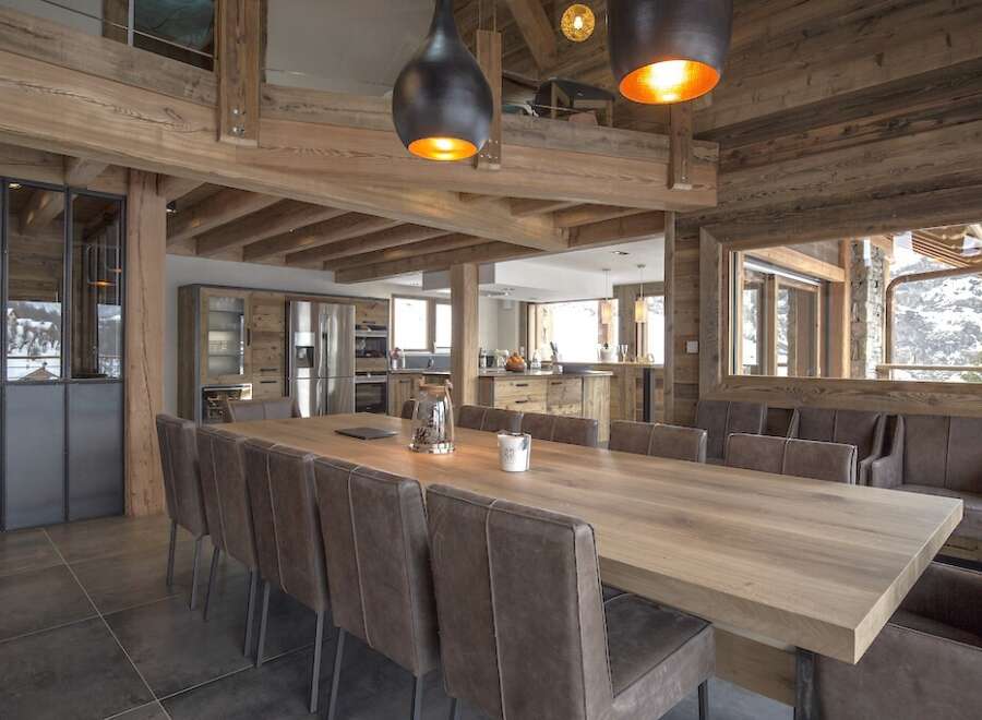 This stunning property boasts a spacious dining area, perfect for hosting gatherings.