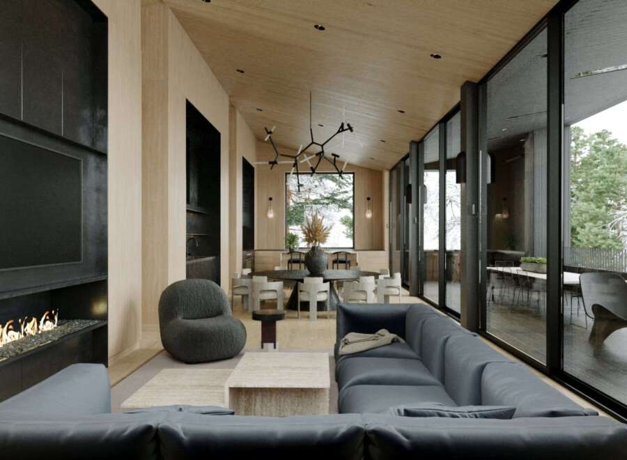 Experience luxury living in this stunning property, featuring a modern interior design with a cozy fireplace and a sleek, contemporary sofa.