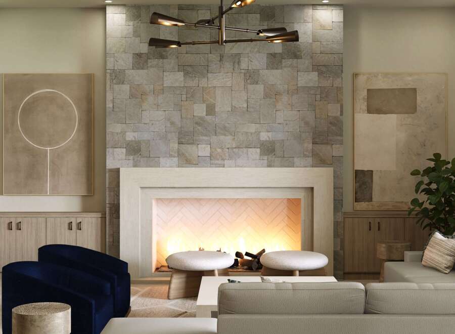 Experience luxury living in this stunning property featuring a cozy fireplace with a stone accent wall, perfect for creating a warm and inviting atmosphere.