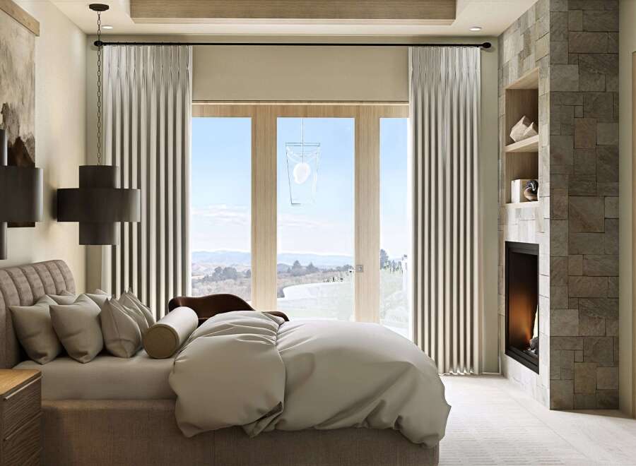 Experience luxury living in this stunning bedroom featuring a cozy fireplace and expansive windows that offer breathtaking views.