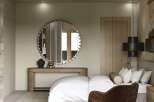 Step into a serene bedroom retreat, where modern design meets ultimate comfort.