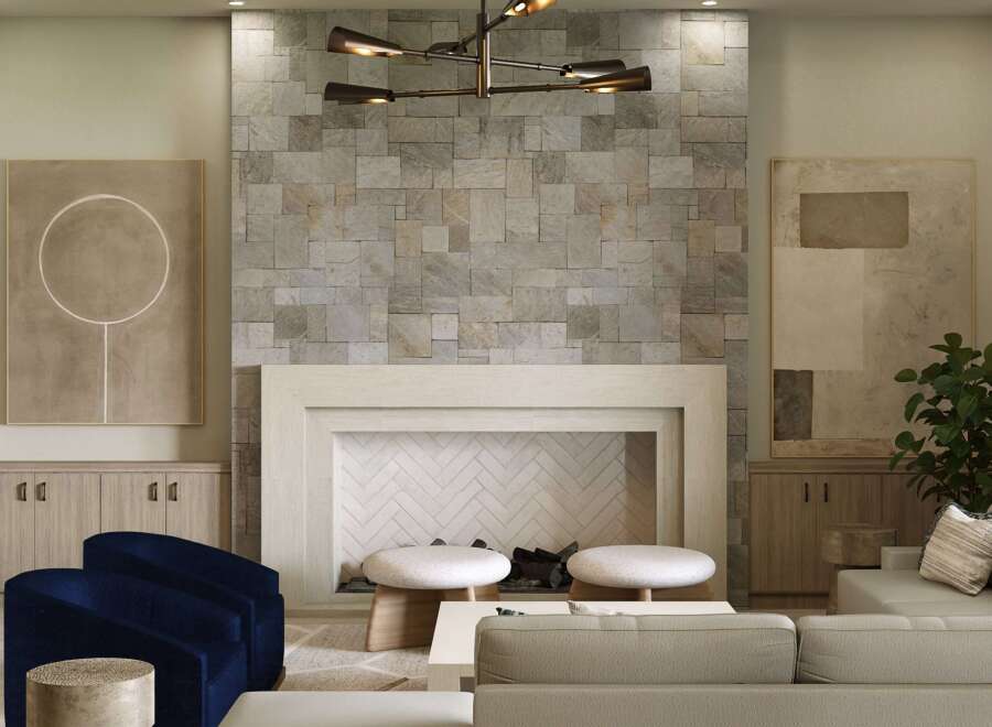 Experience luxury living in this stunning property featuring a cozy fireplace with a stone accent wall, perfect for creating a warm and inviting atmosphere.