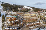 Discover the charm of this stunning mountain property, nestled in a picturesque ski resort.