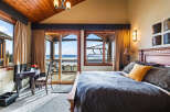 Experience luxury in this stunning bedroom with breathtaking views.