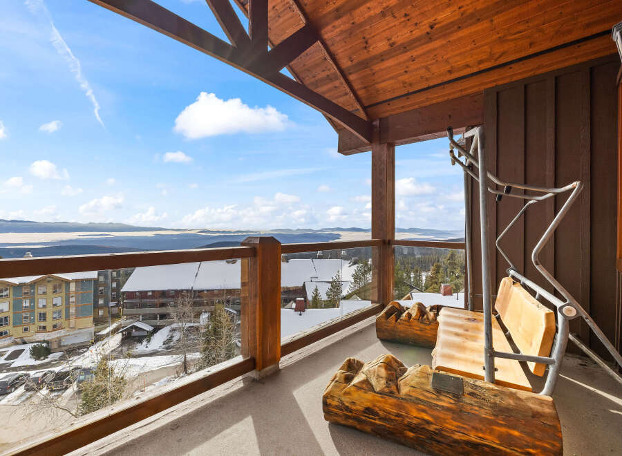 Enjoy breathtaking mountain views from this stunning balcony.