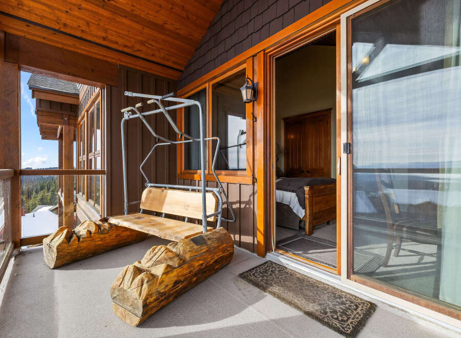 Enjoy the stunning mountain views from this luxurious balcony.
