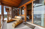 Enjoy the stunning mountain views from this luxurious balcony.