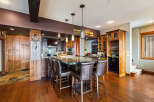 This stunning kitchen boasts a large island with seating, perfect for entertaining.