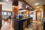 This stunning kitchen boasts a modern design with high-end appliances and ample counter space, perfect for culinary enthusiasts.