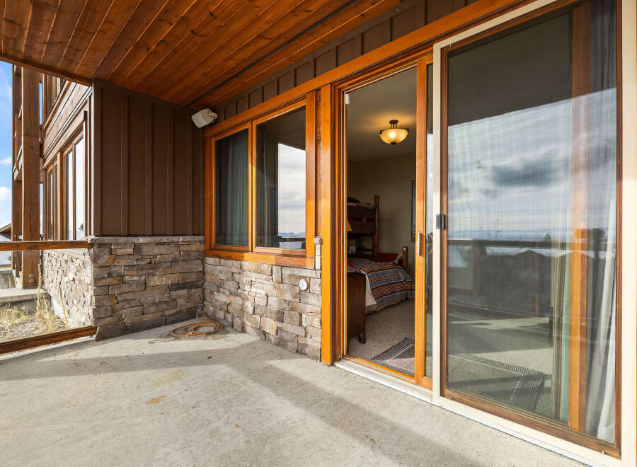 Step into luxury with this stunning property, featuring a spacious outdoor patio perfect for entertaining or relaxing.