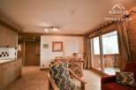 Discover the charm of this inviting property, featuring a cozy dining area perfect for gatherings.