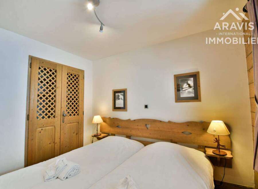 Discover the charm of this inviting bedroom, perfect for a relaxing retreat.